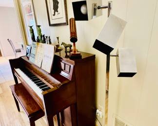 Yamaha upright piano. Mid-Century modern DMI chrome, three light floor lamp. Square fixtures and base. 