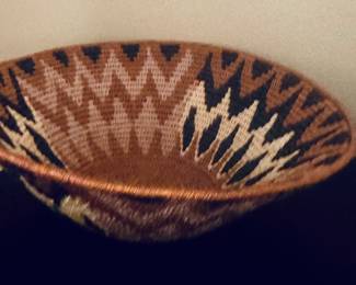 Makalani palm leaf basket from Namibia with a distinctive geometric pattern.