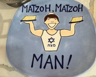 Our Name Is Mud by Lorrie Veasey platter features a humorous cartoon character declaring "Matzoh, Matzoh Man!"