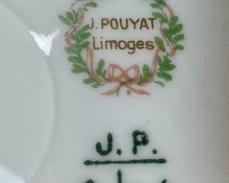 Limoge gilt-decorated porcelain plate, potentially manufactured by Cauldron China or Crown Staffordshire in England.The item features an ornate, gold-encrusted border with decorative floral or scroll patterns on a white ground.