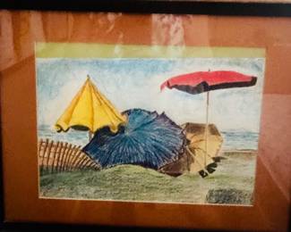 This framed artwork titled "Beach Umbrellas" is a watercolor painting by artist Pat Applegate, featuring a vibrant coastal Scene