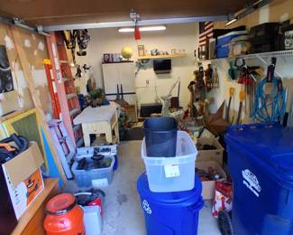 Garage full of sports equipment and tools and Holiday decor, Bike etc.