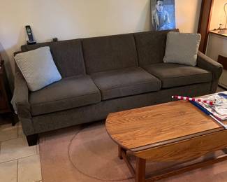 The sofa is a green color 