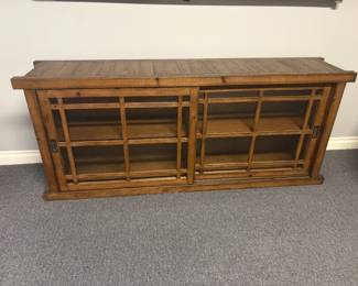 Sliding door TV stand