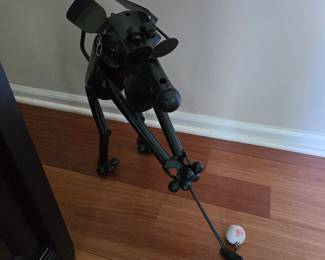 Metal golfing dog