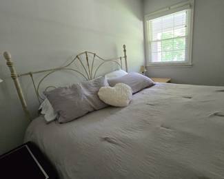 White metal frame bed