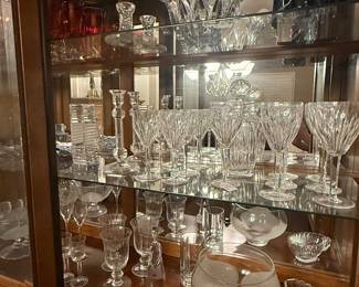 Large china cabinet with china and glassware collection