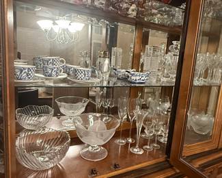 Large china cabinet with china and glassware collection