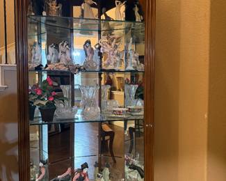 Mirrored cabinet with speciality collectibles