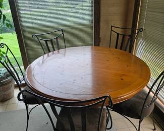 Round Wrought Iron and wood dining table & 5 metal chairs 