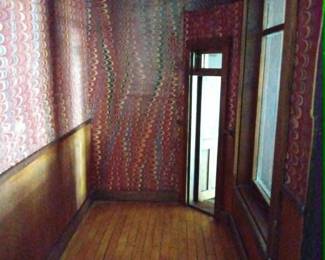 From the Sidney Sheldon estate interior, fully laid wooden floor with door that opens and closes.