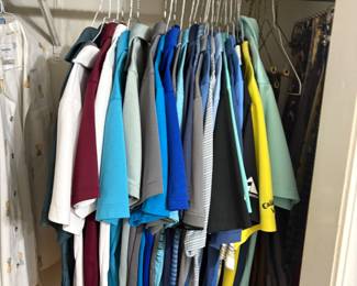 Very large collection of golf shirts