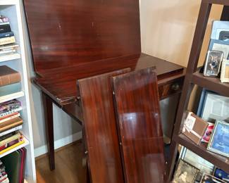 Vintage table that folds small enough enough to be used as desk