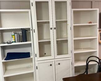 Three separate shelving units