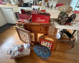 Vintage pie storage with red white and blue accessories, including a vintage bread box and many other Vintage accessories are red, white and blue