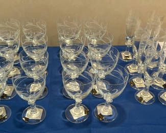 Lot 34: Etched Wine Goblets and Champagne Flutes Set