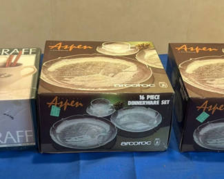 Lot 16: Pfaltzgraff Christmas Heirloom Mug Set and Arcoroc Aspen Dinnerware Sets