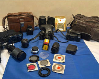 Lot 92: Minolta SLR Camera Kit, Canon Sure Shot Camera, Lenses, Filters, and Camera Bags