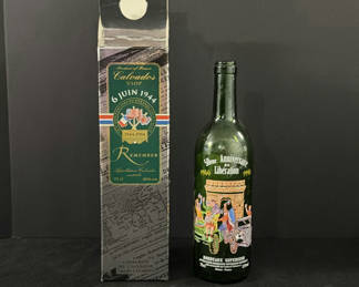 Lot 222: Commemorative Bordeaux Supérieur Wine Bottle and Calvados VSOP Boxed Bottle