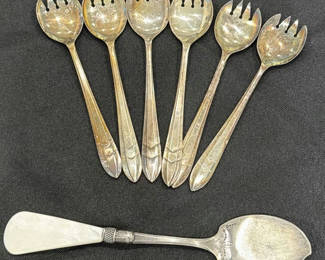 Lot 19: Seven-Piece Silver-Tone Flatware Set