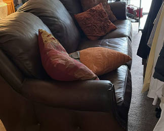 Lot 408: Brown Leather Sofa with Orange and Red Throw Pillows