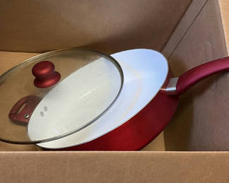 Lot 412: Red covered saucepan with glass lid and assorted cookware