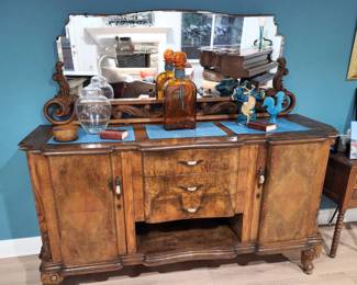 Burled wood sideboard with mirror. Decorative items. 