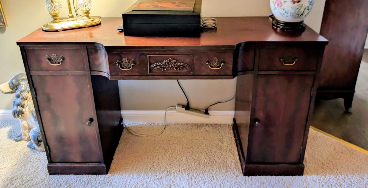 Mahagany Desk with ornate brass drawer pulls