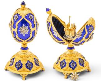 Lot 1235 House of Igor Carl Fabergé, (Russian) Gold Plated Sterling Silver and Enamel 'The Star of the North' Musical Imperial Egg, with Accompanying 14kt Gold