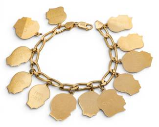 Lot 61 Italian 14k Yellow Gold Charm Bracelet