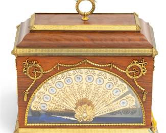 Lot 1227 Igor Carl Fabergé (Russian, 1906-1982) Fan Clock Produced for Franklin Mint, 1984, H 5" W 10" L 10"