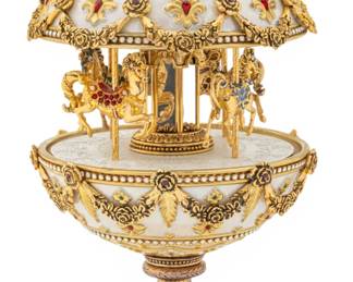 Lot 1234 House of Igor Carl Fabergé, (Russian) Porcelain and Gilt Metal, Imperial Carousel Musical Egg, Ca. 1996, H 11" Dia. 5.5" 1 PC