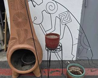 14CT618Clay Chiminee, Kokopelli Metal Art And More