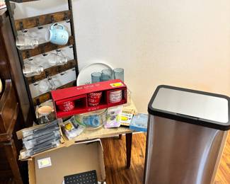 Wood rack, New shower headset, New battery operated garbage can, Black drawer handle sets, Clear glass set and glass mug sets, phone accessories, glass bowl, coco set.