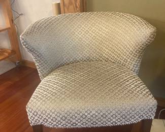 Custom upholstered boudoir chair.