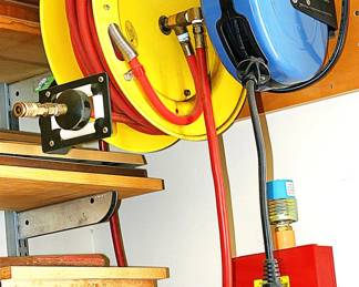 Hose Reel and Electric Extension Cord Reel from a Tool Collector's Shop