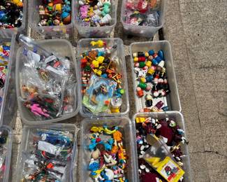 Tons of action figures, little plastic guys, McDonald’s toys in bags many decades 