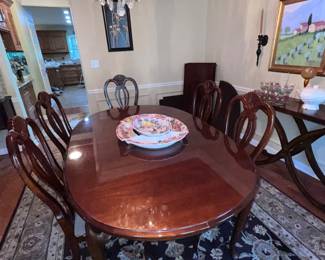 Dining room table with extra leaves