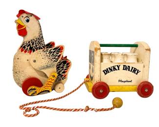 Vintage wooden pull-toys. Vintage Playskool "Dinky Dairy" pull toy, likely dating from the 1940s to early 1950s and Vintage Fisher-Price "Queen Hen" Pull Toy.