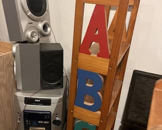 wooden furniture, stereo with speakers