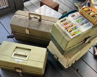 several vintage tackle boxes