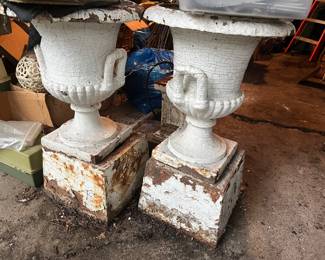 large antique cast iron urns