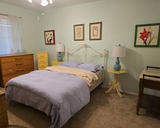 full iron bed with mattress, granite-topped washstand, wicker dresser and more