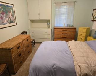 wicker chest of drawers, wooden chest of drawers, small chest of drawers, pair of blue ceramic lamps, full bed