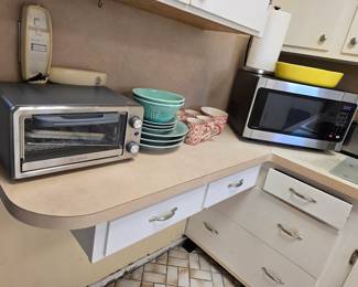 toaster oven, microwave, cups, plates, dishes, etc