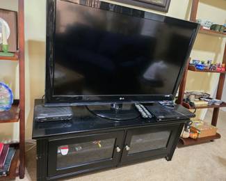 TV and other electronics, TV entertainment center, decorative shelves