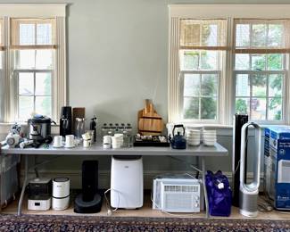 Roomba Vacuum, Google Wifi Mesh Router Pods, Dyson Tower Fan, Levoit Tower Fan, Midea Portable A/C, Black + Decker Portable A/C, Window A/C, Levoit Air Purifier, Levoit Humidifier