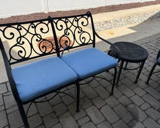 Cast Aluminum loveseat with cushion and side table