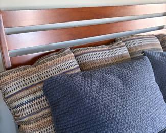 Another view of the headboard to the Queen bed and linens