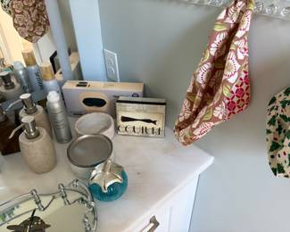 Bathroom decor items and vanity mirror